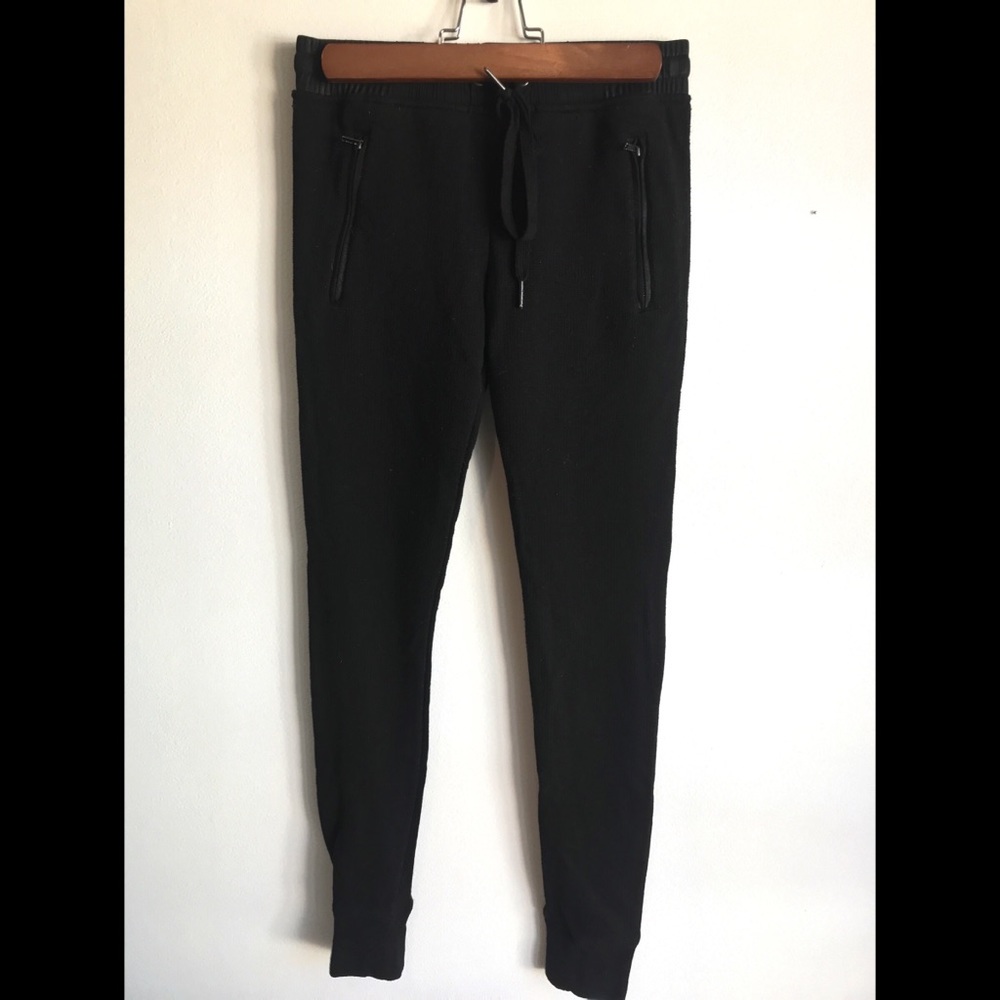 Small, long black joggers